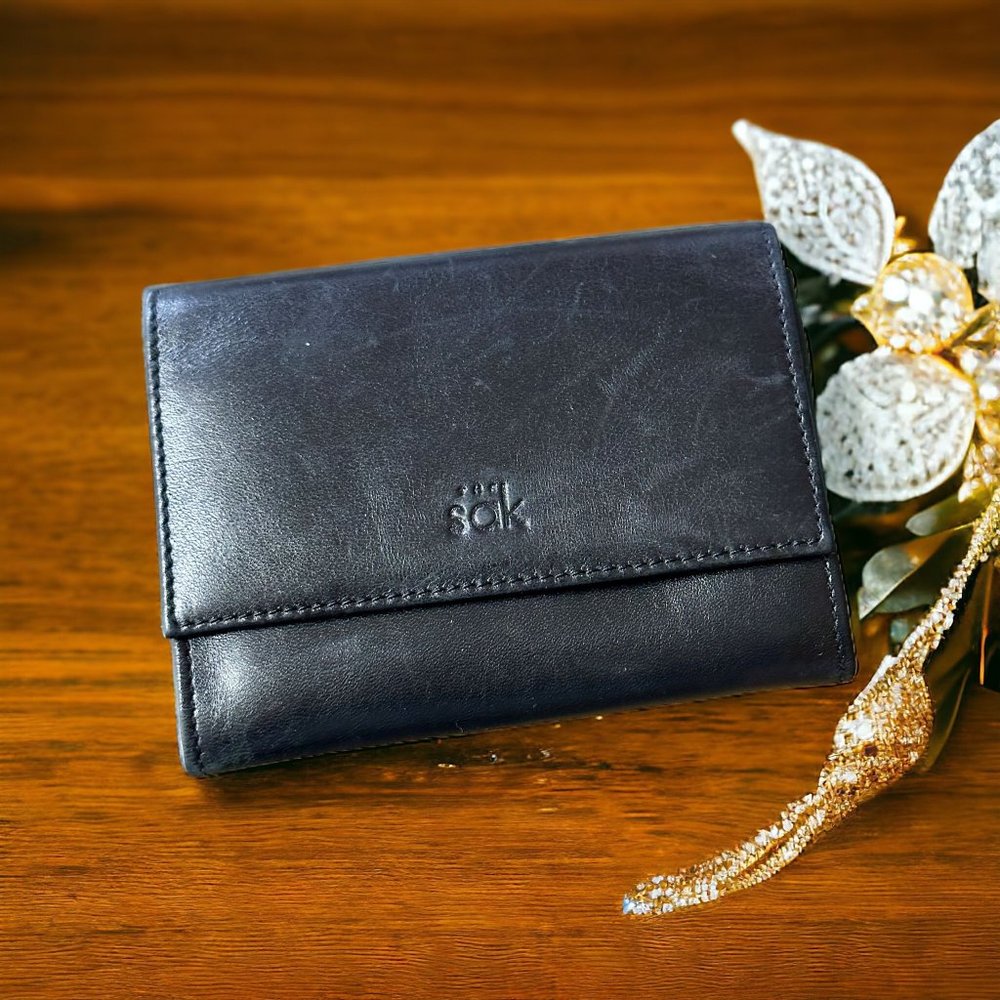 The Sak Black Soft Leather Small Wallet with zippered inside pocket